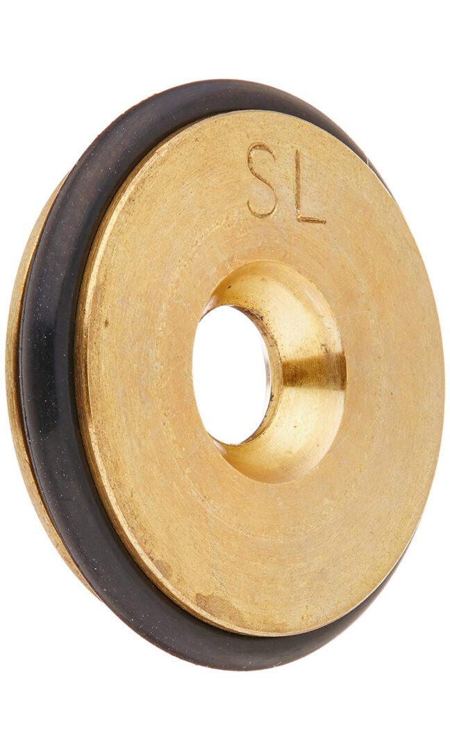 A close up of the bottom end of a gold colored washer.