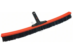 A black and orange brush is on top of the floor.